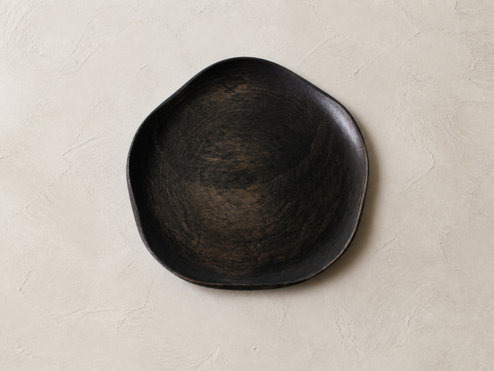 Top view of the empty RIN 5.0 Sesame plate showing circular wood grain