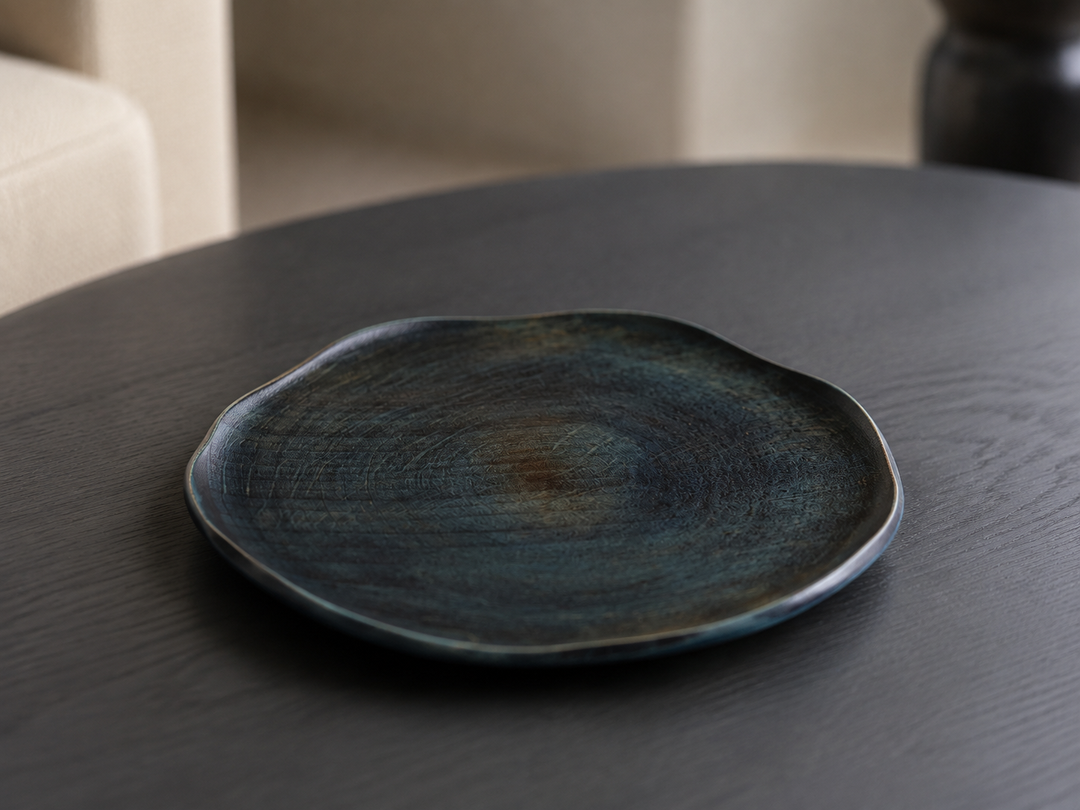 RIN 7.0 Hyacinth shown empty under soft indoor light that reveals its blue-green, brown, and wood-grain variations.