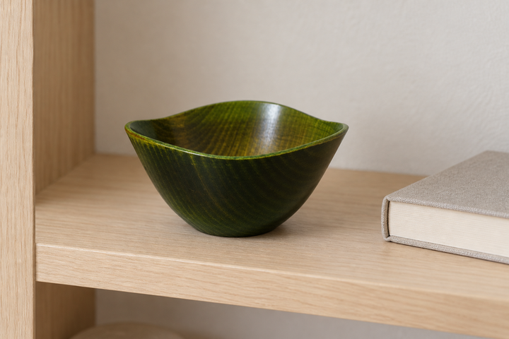 Clean empty RIN Bowl S Olive displayed on an open indoor shelf away from direct sunlight.