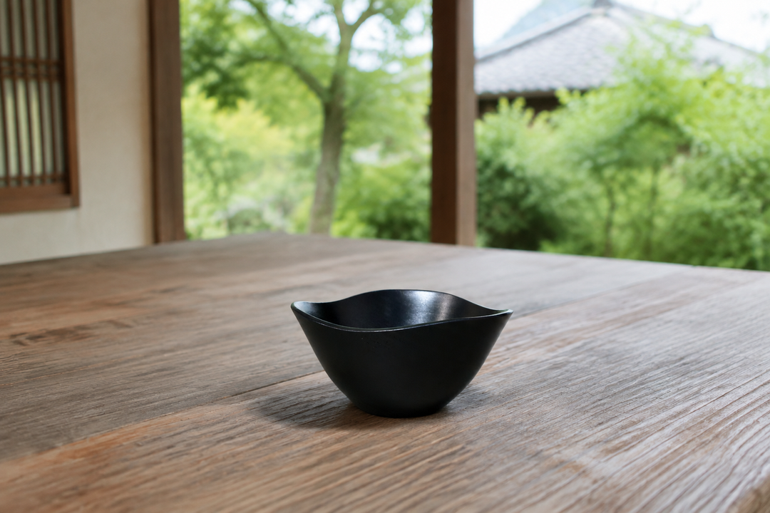 Empty RIN Bowl S Hyacinth on a stable shaded outdoor table for a temporary setting.