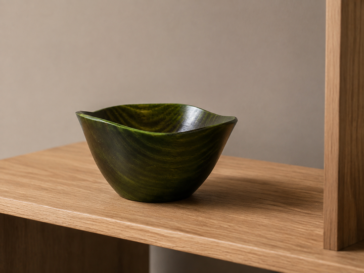 RIN Bowl M Olive displayed as a sculptural object on a dry open shelf away from direct sunlight.