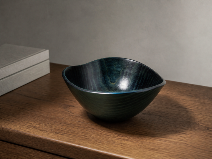 Empty RIN Bowl M Hyacinth displayed on a dry indoor side table, viewed slightly from above to show its rim and interior grain.