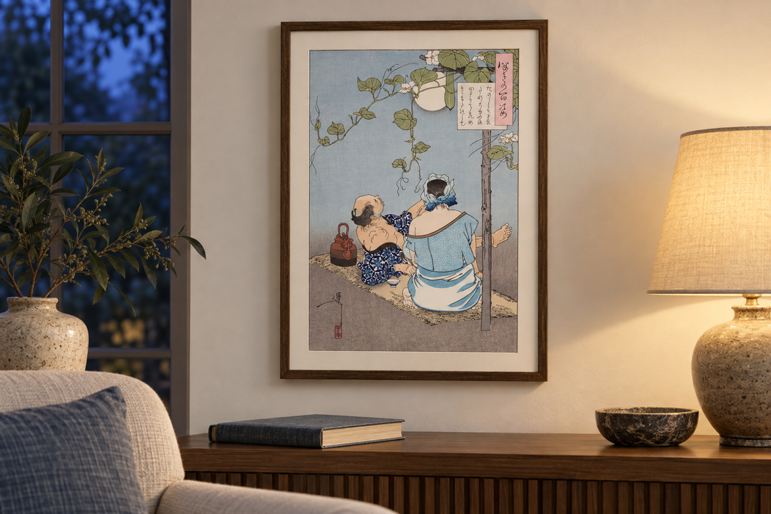The framed Yoshitoshi summer evening print beside a reading chair and a lit table lamp, with a book and bowl below.