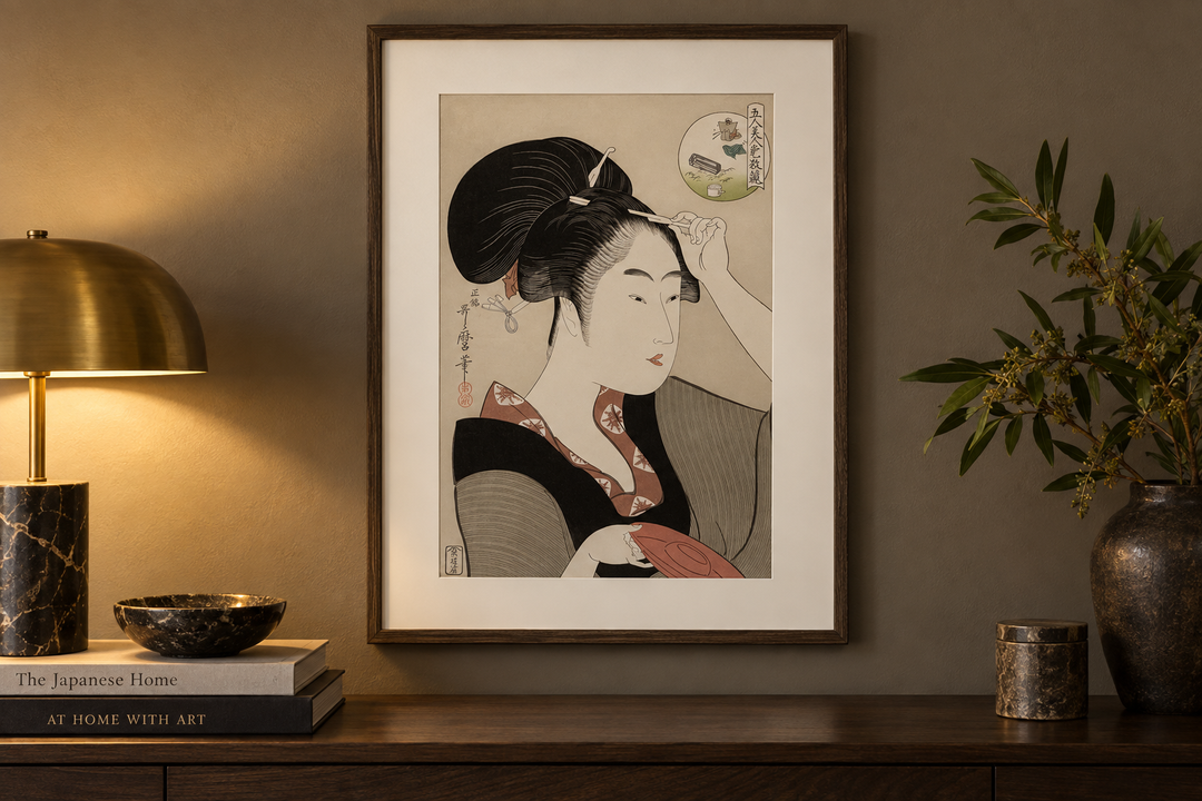 Suminoe from Shiba displayed above a wooden console beside a brass lamp, books, and dark ceramics.