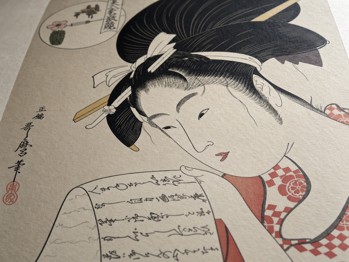 Raking light reveals the layered colors and washi surface of the hand-printed Hanazuma reproduction.