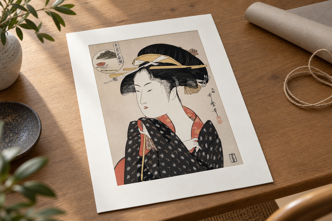 The matted Utamaro print presented as a thoughtful gift on a clean table, with minimal wrapping kept separate.