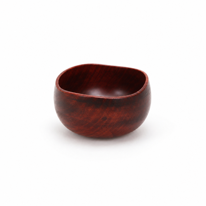 Bud: Berry, a small berry-red Yamanaka lacquerware vessel with a rounded-square rim, on a white background.